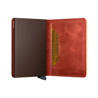 Secrid Slimwallet Vintage with brown leather exterior and soft suede interior, open showing card slot design