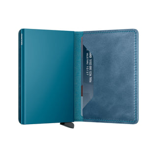 Secrid Slimwallet Vintage in blue European cowhide leather with card partially inserted, open view