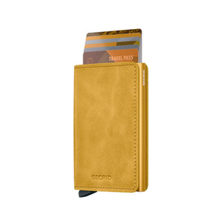 Secrid Slimwallet Vintage mustard yellow cowhide wallet holding multiple cards visible