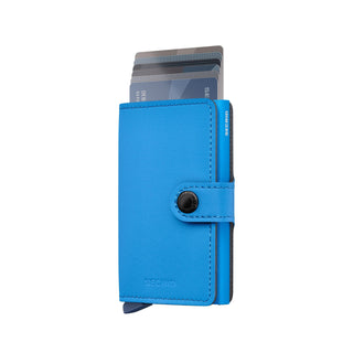 Secrid Miniwallet Yard Powder in blue microfiber with card mechanism open showing multiple cards