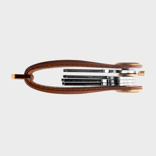 Orbitkey Key Organizer Pro Leather with smooth brown leather and stacked keys viewed from above