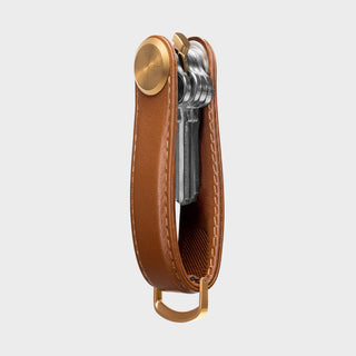 Orbitkey Key Organizer Pro Leather in tan holding keys neatly with brass hardware and stitched detailing