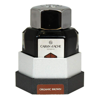 Caran d'Ache Fountain Pen Ink Bottle 50 ml in organic brown with hexagonal glass design and metal cap