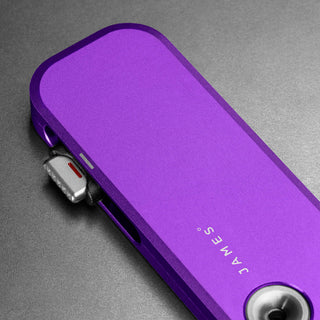 James The Palmer Knife in anodized purple aluminum with a compact slim profile by The James Brand