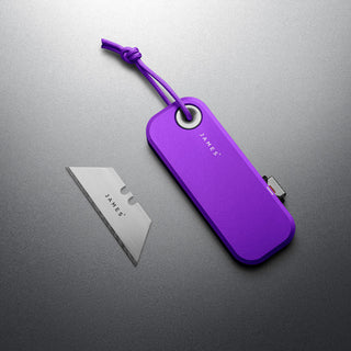 James The Palmer Knife by The James Brand with purple anodized aluminum handle and sharp utility blade