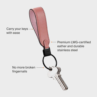 Orbitkey Loop Keychain in pink leather with stainless steel ring holding three keys and text highlights