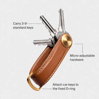 Orbitkey Key Organizer Pro Leather in brown with micro-adjustable hardware and attached keys held by D-ring