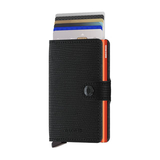 Secrid Miniwallet Rango in black textured European cowhide with cards partially extended and orange metal edge visible