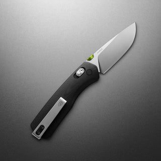 James The Carter Knife showing sleek black textured handle and polished VG-10 steel blade open angle