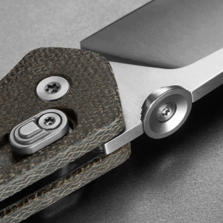 James The Carter Knife close-up showing textured Micarta handle and sleek VG-10 steel blade edge by The James Brand