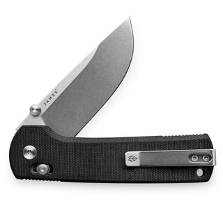 James The Kline Knife partially open showing textured black Micarta handle and steel drop point blade