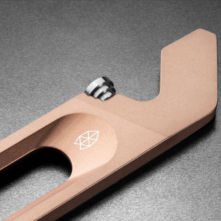 James The Halifax Multitool in titanium showing close-up of textured finish and bottle opener screw detail