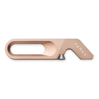 James The Halifax Multitool in matte rose gold titanium with integrated screwdriver and bottle opener design