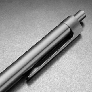 Close-up of James The Burwell Ballpoint Pen titanium clicker and pocket clip