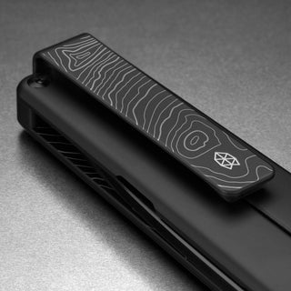 James The Chapter 2 Knife clip detail featuring black titanium with contour line pattern by The James Brand