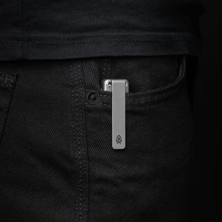 James The Chapter 2 Knife clipped on black denim pocket showing sleek titanium handle by The James Brand