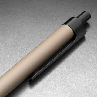 Close-up of James The Burwell Ballpoint Pen Desert Campout clicker and black clip