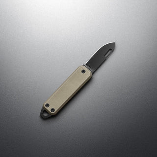 James The Elko Knife with tan Micarta handle and compact Sandvik stainless steel blade open on gray background