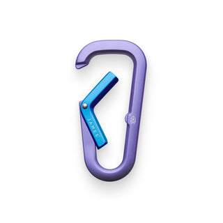 James The Hardin Carabiner in purple anodized aluminum with blue spring-loaded latch, dual compartment design