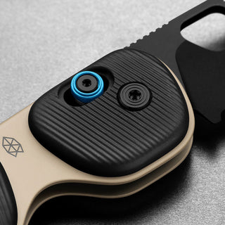 James The Redstone Knife close-up showing textured black polypropylene handle with blue and black screws
