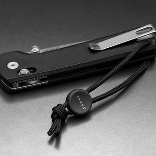 James The Ulu Lanyard & Bead with black nylon paracord and circular bead featuring James Brand logo