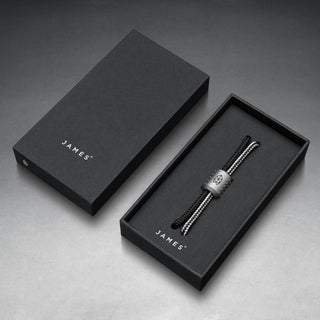 James The Alder Lanyard & Bead with anodized titanium bead and black nylon paracord in branded box