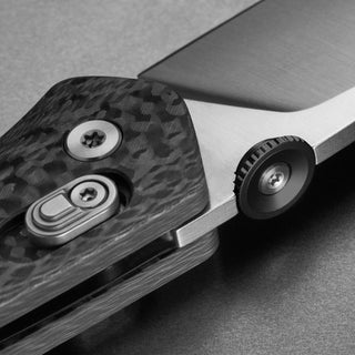 James The Carter Knife showing carbon fiber handle texture and VG-10 steel blade close-up detail