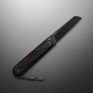 James The Duval Knife with dark rosewood handle and black s35vn steel blade open on gray background