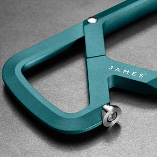 James The Mehlville Carabiner in teal anodized aluminum with stainless steel latch close-up detail