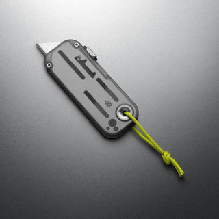 James The Palmer Recycled PC Knife with translucent handle and neon green lanyard from The James Brand