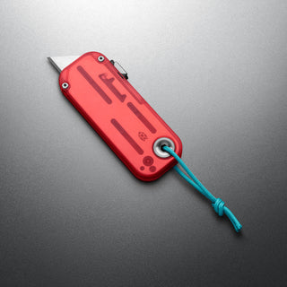 James The Palmer Recycled PC Knife with translucent red recycled PCTG handle and extended utility blade