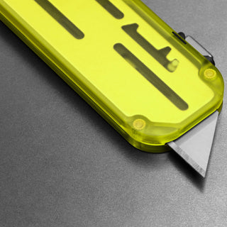 James The Palmer Recycled PC Knife with translucent yellow recycled PCTG handle and sharp utility blade detail