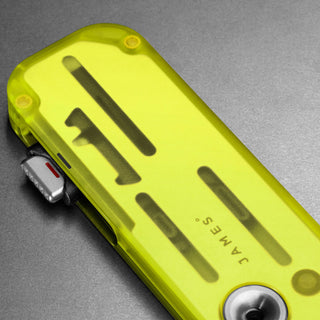James The Palmer Recycled PC Knife in translucent yellow recycled PCTG with visible internal components