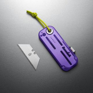 James The Palmer Recycled PC Knife in purple anodized aluminum with lime green lanyard and utility blade