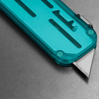James The Palmer Recycled PC Knife with translucent teal handle and exposed high carbon steel blade