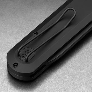 Close-up of matte black aluminum handle and slim pocket clip on James The Wells Knife by The James Brand