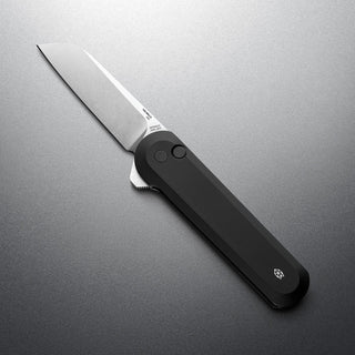 James The Wells Knife with sleek black aerospace aluminum handle and sharp CPM Magnacut blade opened