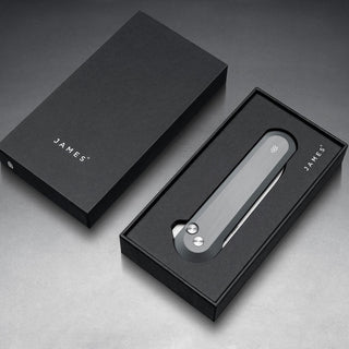 James The Wells Knife with sleek aerospace aluminum handle displayed in premium black packaging
