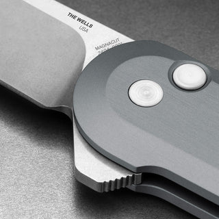 James The Wells Knife close-up showing gray aluminum handle and sharp CPM Magnacut steel blade edge