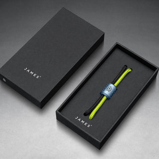 James The Alder Lanyard & Bead with anodized blue titanium bead and black and neon green nylon cord in black box