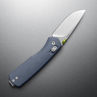 James The Carter Knife with blue Micarta handle and VG-10 steel blade in a sleek folding design