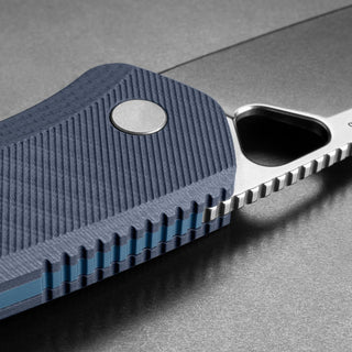 James The Folsom Pro Knife with textured blue G10 handle and stonewash finish blade edge detail