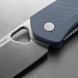 James The Folsom Pro Knife with textured blue G10 handle and stonewash finish steel blade close-up