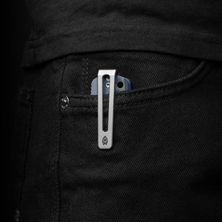 James The Folsom Pro Knife with stonewash finish clip secured in black denim pocket