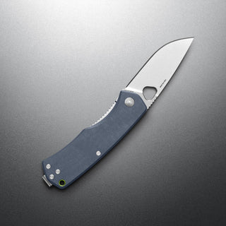 James The Folsom Knife with blue G10 handle and VG-10 steel blade by The James Brand displayed open