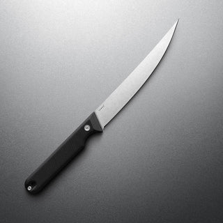 James The Humboldt Knife with sleek Böhler N690 steel blade and textured black G10 handle on gray background
