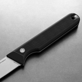 Close-up of James The Humboldt Knife handle with textured black G10 material by The James Brand