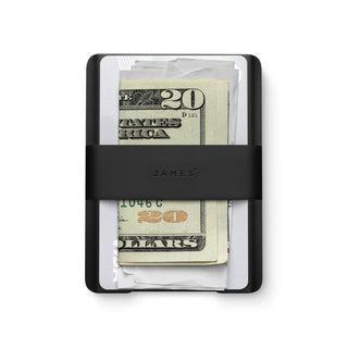 James The Lowe Wallet by The James Brand in black aluminum with silicone band holding cash and cards