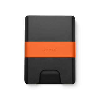 James The Lowe Wallet in black aluminum with an orange silicone band by The James Brand