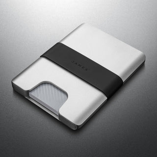 James The Lowe Wallet with silver aluminum body and black silicone band by The James Brand